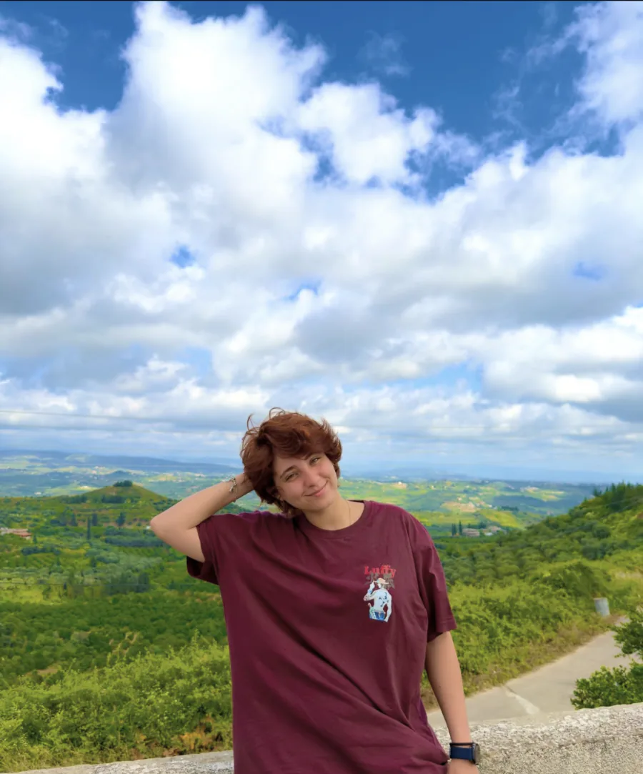 Teema Bashar Alakel outdoors overlooking a valley